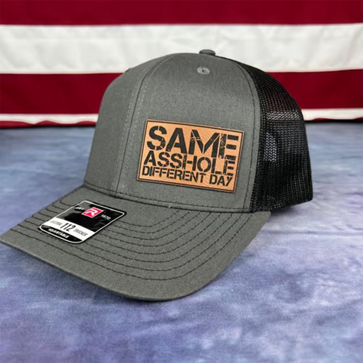 SAME ASSHOLE DIFFERENT DAY Hat